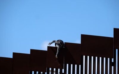 Migrants’ Border Wall Falls Devastating — and Costly
