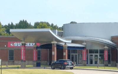 Memphis School Employee Accused of Stabbing Delivery Driver Multiple Times With Pen
